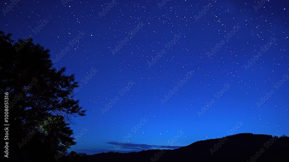 Star Earth Sky - Deep Blue Night Sky Wallpaper Background. A captivating view of the starry sky above Earth, with a deep blue hue creating a mesmerizing and dreamy backdrop Star Earth Sky - Deep Blue Night Sky Wallpaper Background. A captivating view of the starry sky above Earth, with a deep blue hue creating a mesmerizing and dreamy backdrop