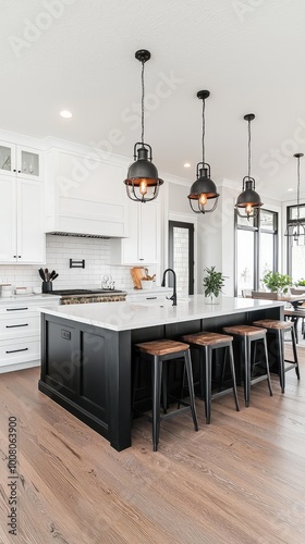 Stylish modern kitchen featuring a spacious island, elegant lighting, and contemporary design. Perfect for a chic culinary space.