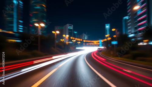 speedy light lines glow with motions on the city night curvy road with Colorful bokeh background.