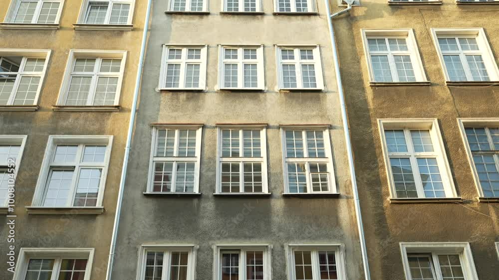 Symmetrical shot of townhouse in Gdansk, Poland. Reconstructed Gothic-Renaissance architecture Symmetrical shot of townhouse in Gdansk, Poland. Reconstructed Gothic-Renaissance architecture
