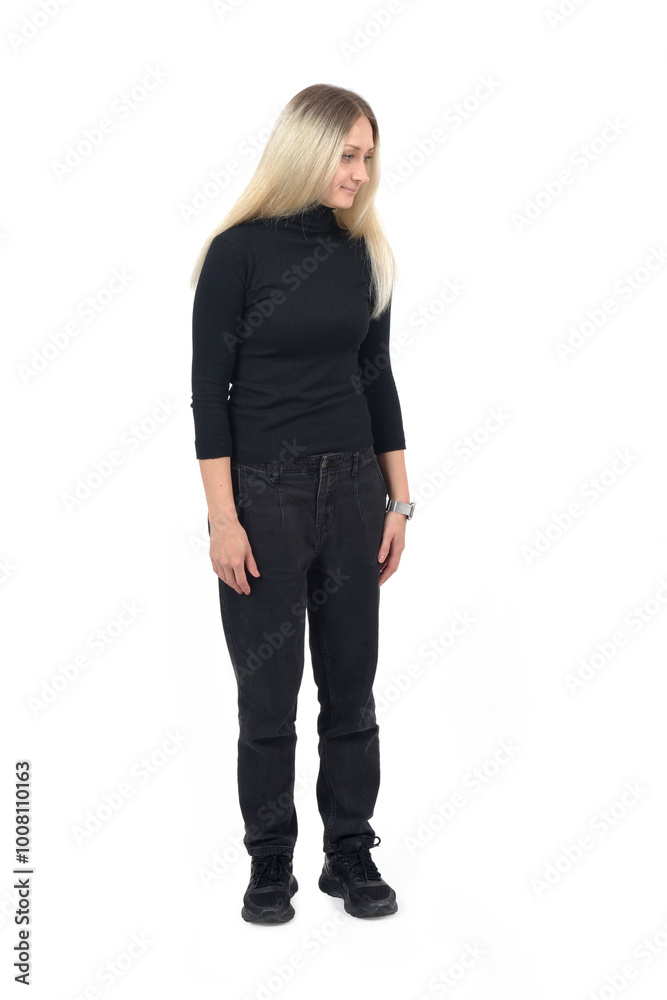 front view of portrait of a blonde woman standing and look to the side and down on white background front view of portrait of a blonde woman standing and look to the side and down on white background
