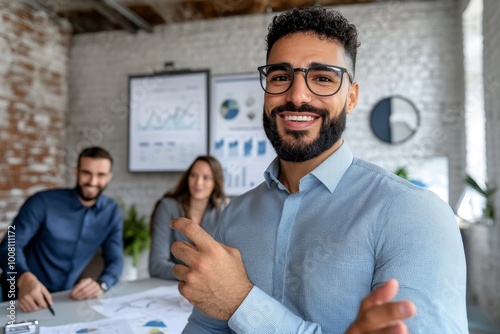 A business meeting in a bright conference room, with charts and ideas spread out, as the team prepares to seize tomorrowâ€™s opportunities with enthusiasm and strategy