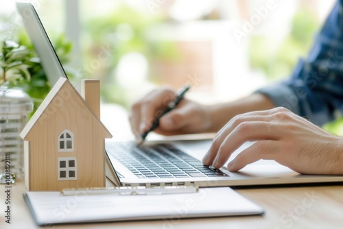 A real estate agent conducting a comparative market analysis CMA for clients on a laptop, CMA report, property analysis photo