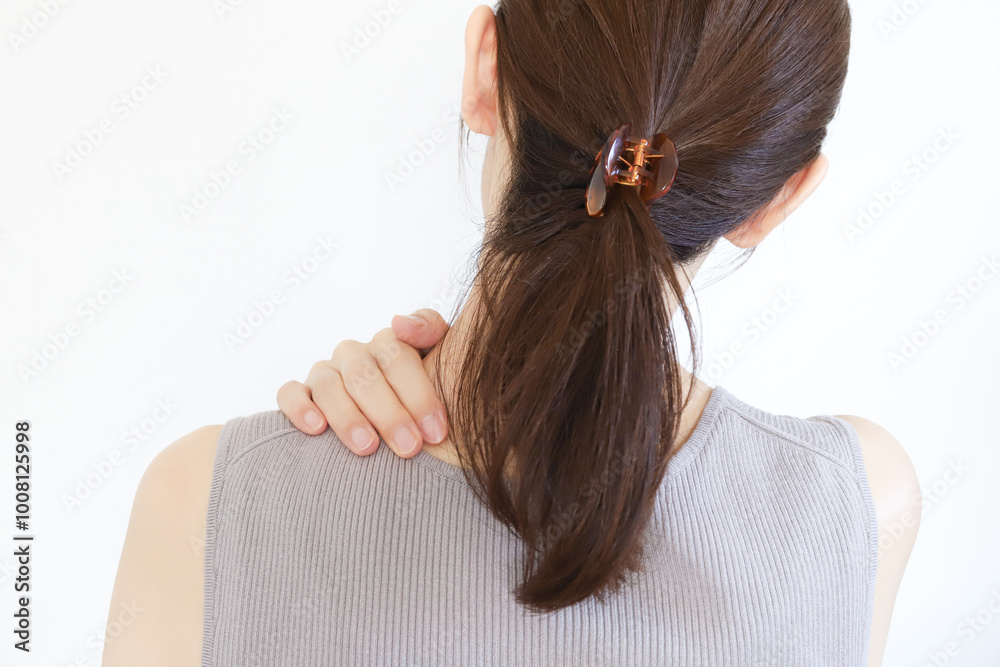 Naklejka premium 肩凝りの女性 疲労イメージ