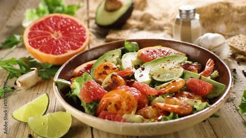 mixed salad with grilled shrimp, avocado, and grapefruit. Ideal for festive meals and healthy eating