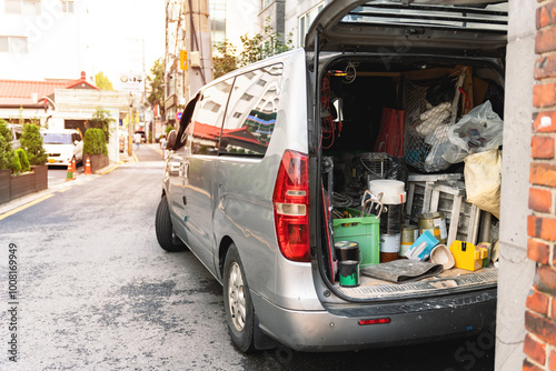 The inside of a van loaded with many tools, used by a home repair carpenter, Organise tools in the rear of vehicle concept