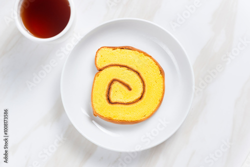 Canvastavla roll cake or Bolu Gulung pieces with cream