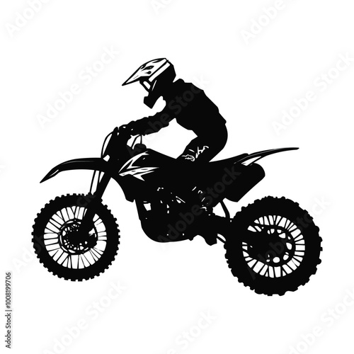 silhouette of a Dirt bike rider doing a jump