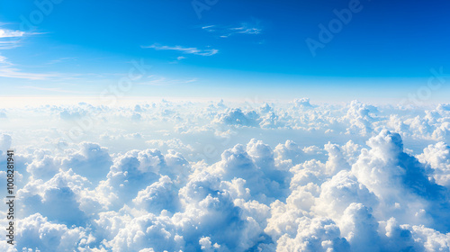 Stunning View of Fluffy Clouds and Clear Blue Sky from Above