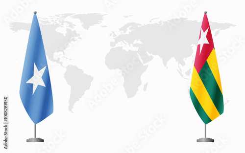 Somalia and Togo flags for official meeting against background of world map.