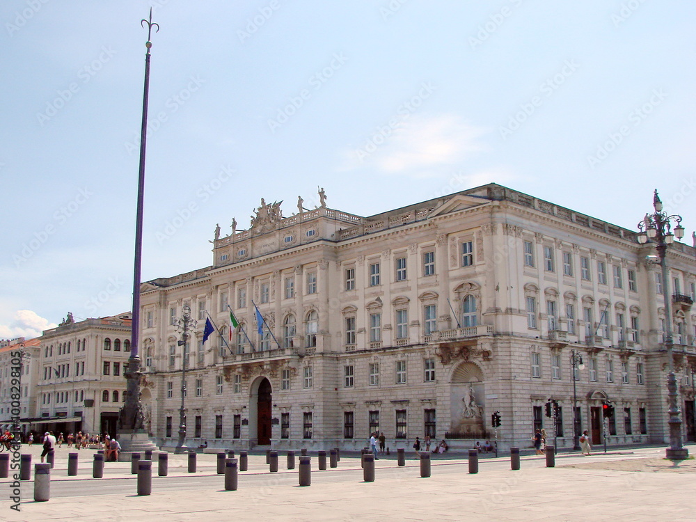 Fototapeta premium The grandeur and dignity of Italian architecture embodied in the Lloyd Triestino Palace on Piazza del Unita.