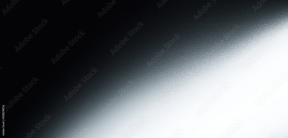 An abstract gradient image transitioning from deep black to bright white, creating a smooth transition of tones and textures. An abstract gradient image transitioning from deep black to bright white, creating a smooth transition of tones and textures.
