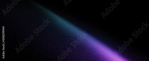 A vibrant, colorful light trail fades into darkness, creating a stunning visual effect with hues of blue and purple.