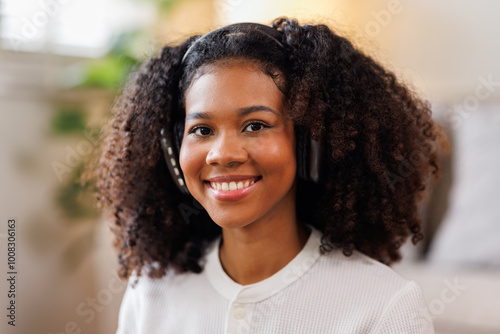 Hair care, portrait of african american girl smiling happy with her afro hair it home