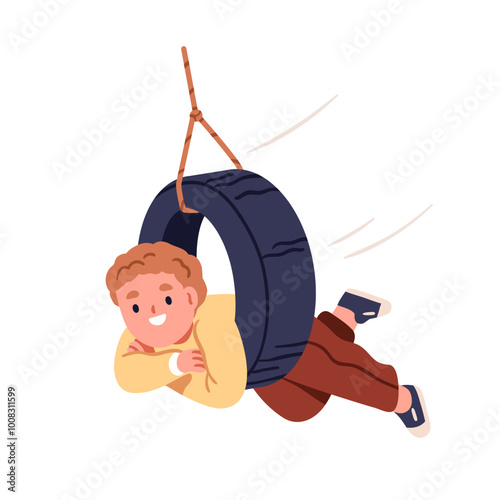 Boy playing on tire swing, smiling. Happy cheerful child enjoying outdoor fun...