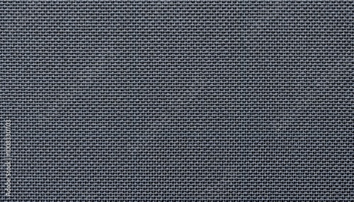 Close-up of dark gray textured fabric showing woven pattern and surface details, textured nylon surface