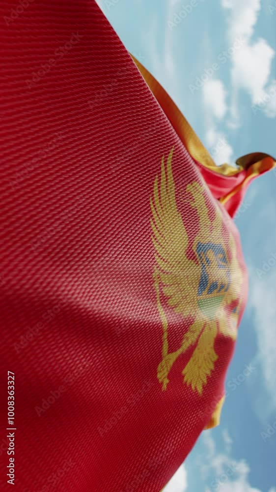 Wavy flag of Montenegro blowing in the wind in slow motion. Waving ...