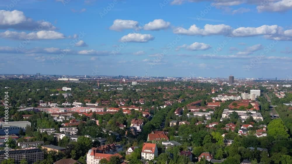 berlin zehlendorf suburb showing buildings and s bahn train station on a sunny summer day. Fantastic aerial view flight descending drone berlin zehlendorf suburb showing buildings and s bahn train station on a sunny summer day. Fantastic aerial view flight descending drone