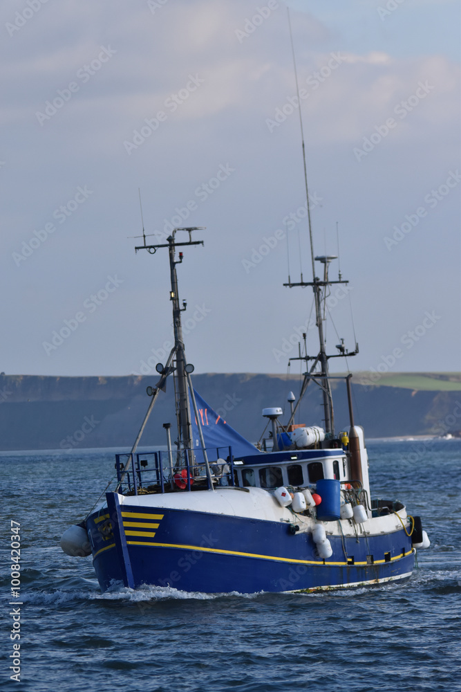 Small fishing boat in the North Sea, Scarborough Small fishing boat in the North Sea, Scarborough