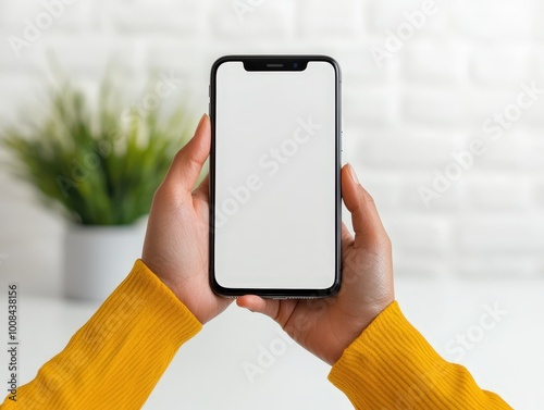 A hand hovering over a feedback submission button on a smartphone, clean white desk background with bright light with space for text
