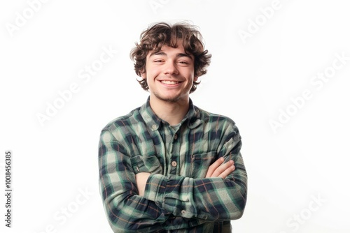 Image of a joyful young man with arms folded, isolated on white , background blur