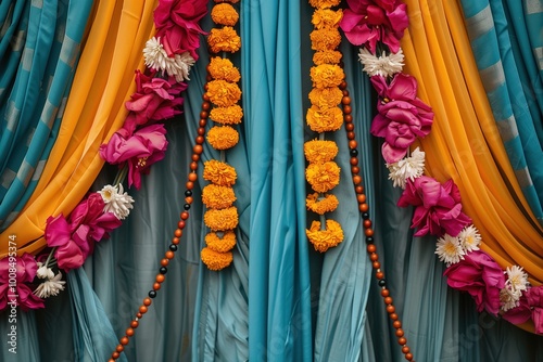 Colorful indian wedding decoration, copy space. Floral garlands and draped fabrics, festive atmosphere. Background for invitation or greeting card. Traditional indian celebration, cultural heritage photo