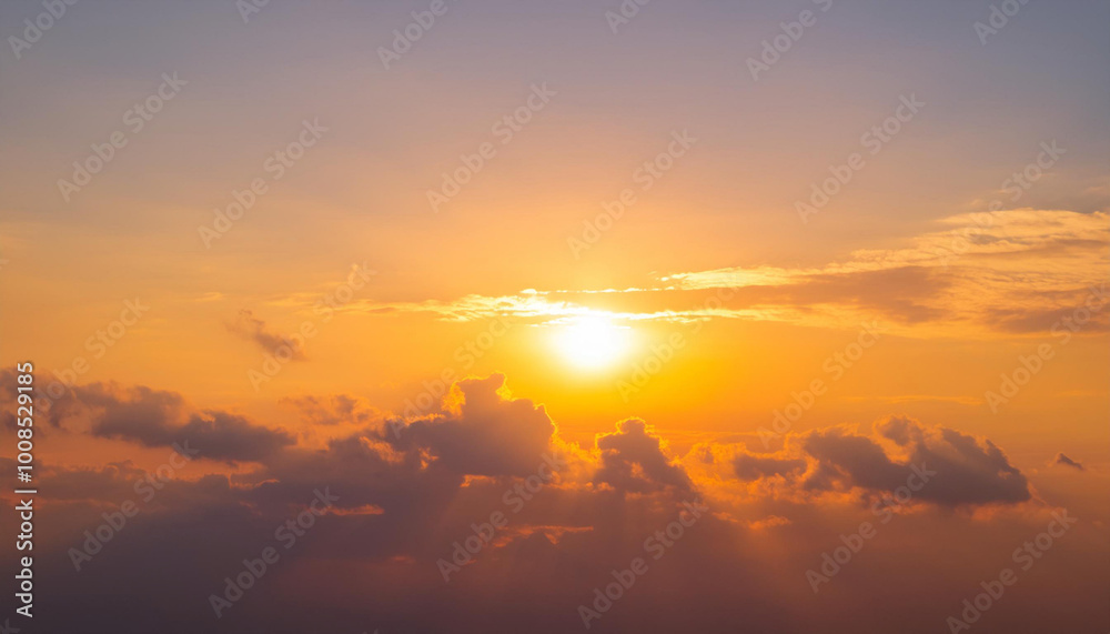Sun Setting Over Clouds in Sky and Copy Space Sun Setting Over Clouds in Sky and Copy Space