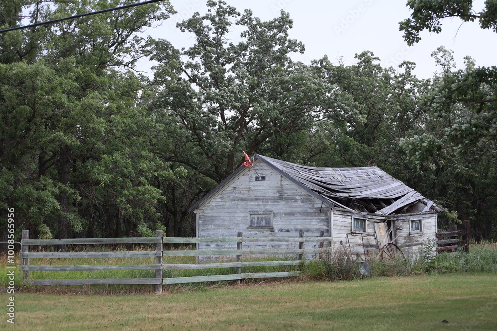 wide-angle abandoned farmhouse collapsing into itself wide-angle abandoned farmhouse collapsing into itself