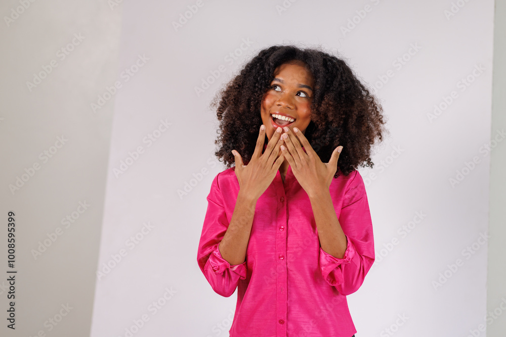 Portrait of stylish african american woman in afro hair standing making hand and posing on white background
Portrait of stylish african american woman in afro hair standing making hand and posing on white background