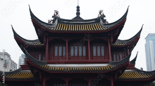 Ancient Chinese Pagoda with Curved Roof and Yellow Decorations