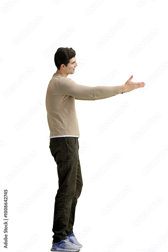 A man, full-length, on a white background, spreads his arms A man, full-length, on a white background, spreads his arms