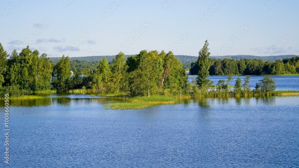 Kizhi Island, Russia, July 10, 2024. Green Cape on the lake. Kizhi Island, Russia, July 10, 2024. Green Cape on the lake.
