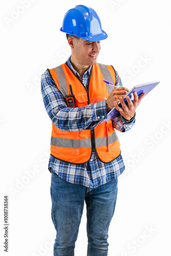 vertical Construction worker writing in a notebook with a pen wearing orange vest and safety helmet