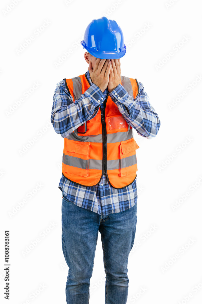 vertical Despondent construction worker covering his face with hands wearing orange vest and helmet vertical Despondent construction worker covering his face with hands wearing orange vest and helmet