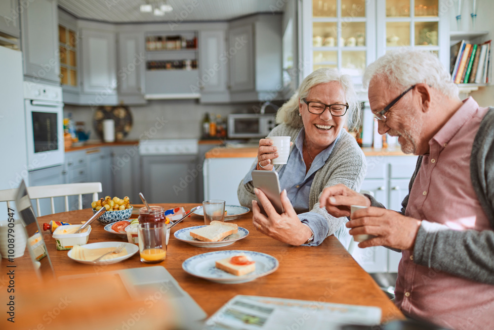 Happy senior couple eating breakfast together at kitchen table Happy senior couple eating breakfast together at kitchen table