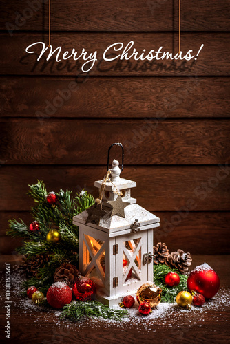 Obraz na płótnie Merry Christmas! Merry Christmas and Happy New Year. Wooden lamps with candles, Christmas tinsel, fir branches and snow on a dark wooden background w salonie