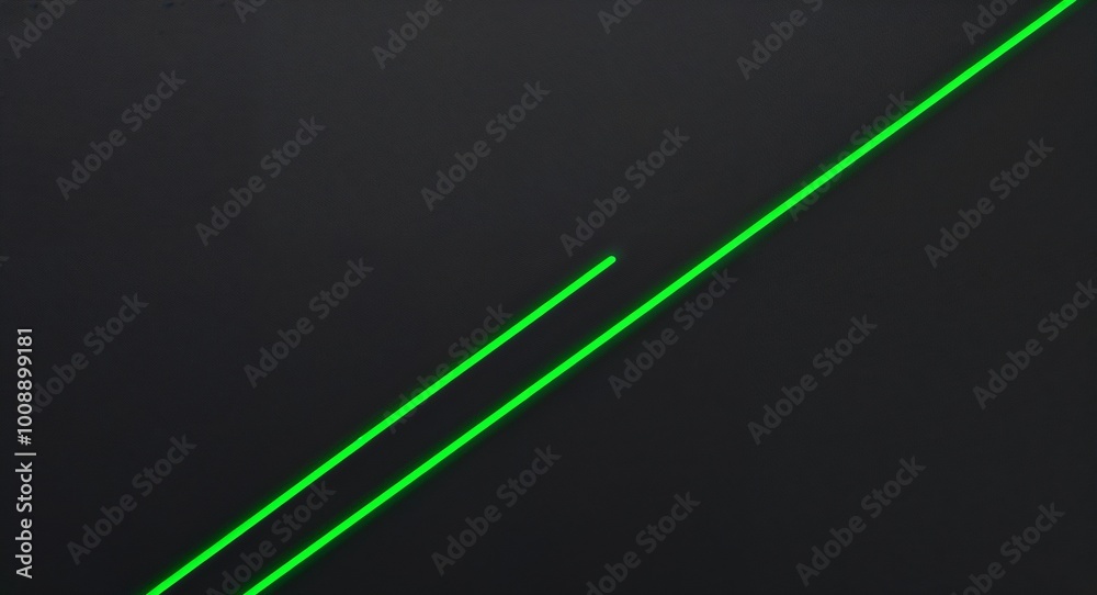Sleek green laser line angled elegantly on a plain black canvas