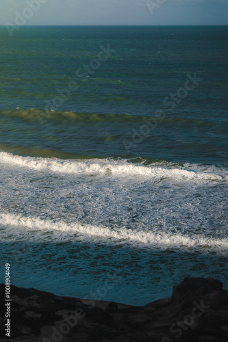 Beach seen from the top of the mountain, blue sky, nature, mountain, cliffs, Tropical climate, summer climate, beach day - Photo in Praia da Pipa - RN, Brazil