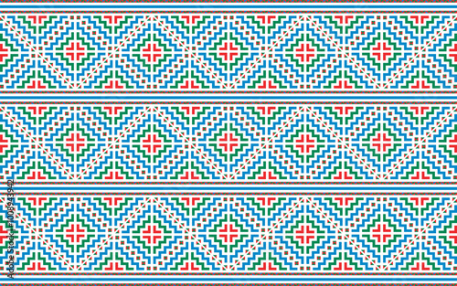 Hmong ethnic patterns designed in green, blue, and red tones that are unique to this ethnic group are used in clothing design.