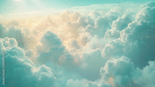 A serene view of fluffy clouds illuminated by soft sunlight.