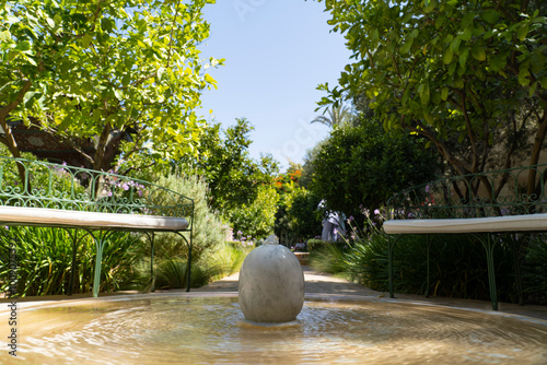 Slika na platnu A marble water feature bowl in the covered central feature of the Islamic section in The Secret Garden, Le Jardin Secret, in the Medina district of Marrakech, Morocco