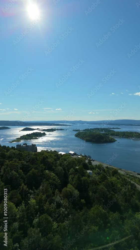 Oslo Fjord near Oslo City and Islands on Summer Sunny Day. Norway. Aerial Drone Shot. Moving Sideways. Vertical Video Oslo Fjord near Oslo City and Islands on Summer Sunny Day. Norway. Aerial Drone Shot. Moving Sideways. Vertical Video