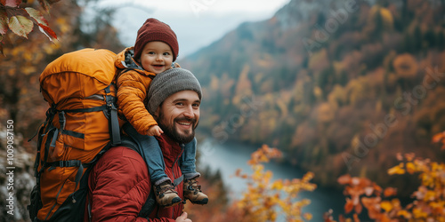 parent carrying baby during autumn hike in the mountains