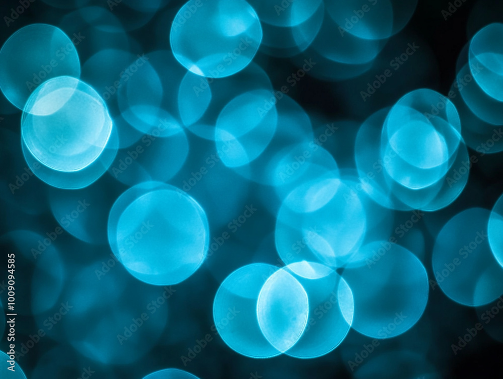 Blurred light blue circles on a dark background. Abstract bokeh lights. Blurred light blue circles on a dark background. Abstract bokeh lights.