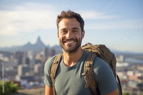 Portrait of a smiling man in his 30s sporting a breathable hiking shirt isolated in vibrant city skyline photo