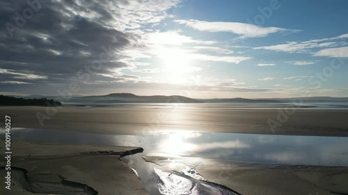 4K: Aerial Drone Video of the beach and sand across Morecambe Bay from Grange over Sands in Cumbria, England, UK. Dawn Sunrise shot. Stock Video Clip Footage photo