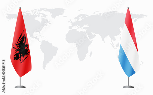 Albania and Luxembourg flags for official meeting against background of world map.