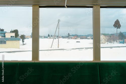 Obraz na płótnie Traveling to Akita, Japan. View of winter scenery from train w salonie