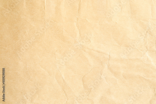 Crumpled yellow background paper texture