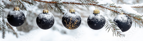 Christmas tree snowy branches with black and gold balls ornaments